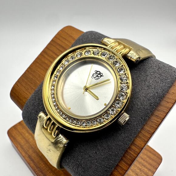 Elizabeth Taylor Accessories - Elizabeth Taylor Gold Tone Rhinestone Bezel Women's Quartz Watch Metallic Strap